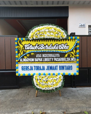Papan Bunga Duka di Telang Baru